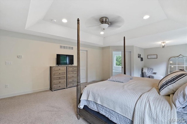 472 Cypress Creek Ln, Imperial, MO 63052 - bedroom featuring a tray ceiling, light colored carpet, baseboards, recessed lighting, and a ceiling fan