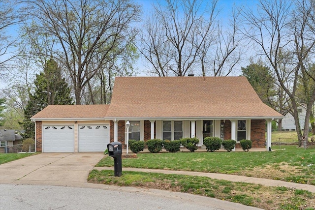 5 Calderabby Rd, Florissant, MO 63033 - view of front of property with an attached garage, driveway, brick siding, and a shingled roof