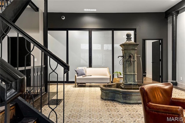 429 N Euclid Ave, Saint Louis, MO 63108 - living area with ornate columns and baseboards