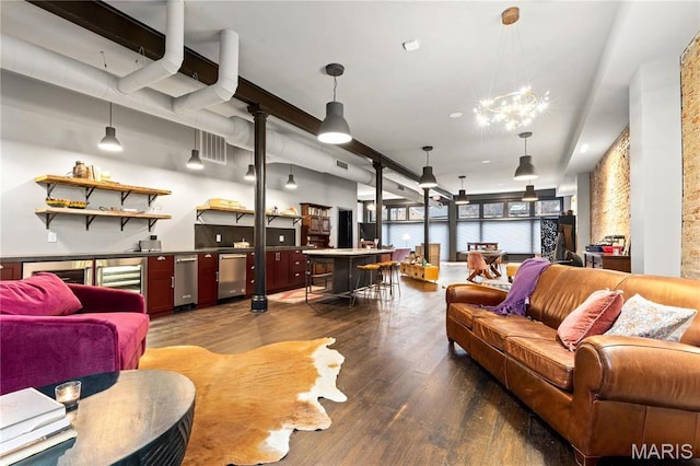 429 N Euclid Ave, Saint Louis, MO 63108 - living room featuring wood finished floors, bar area, and wine cooler