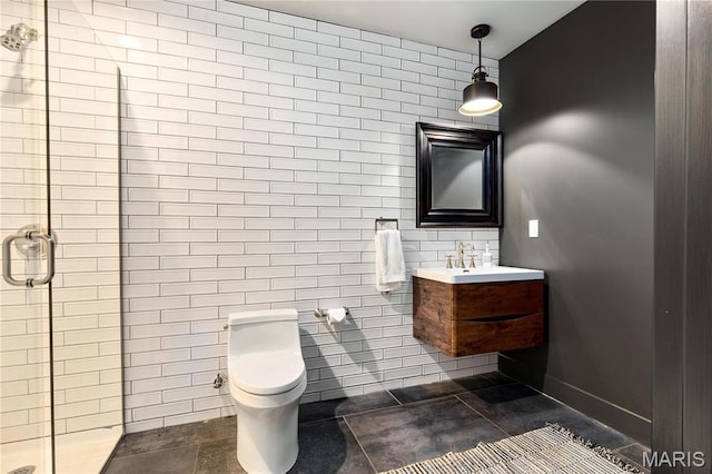 429 N Euclid Ave, Saint Louis, MO 63108 - full bathroom with tile walls, a shower stall, vanity, and toilet