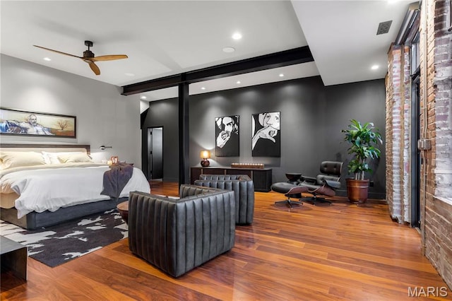 429 N Euclid Ave, Saint Louis, MO 63108 - bedroom with wood finished floors, a barn door, recessed lighting, and beam ceiling