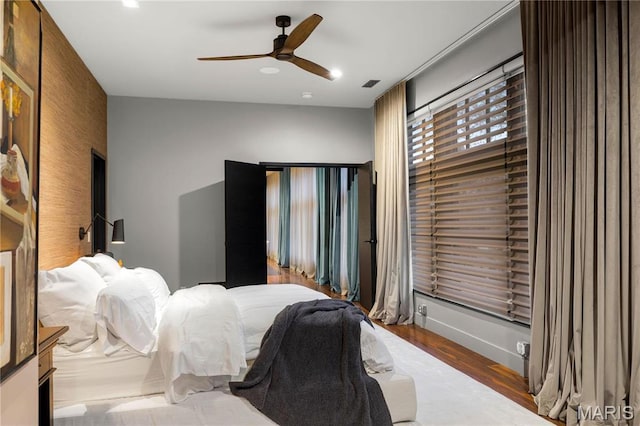429 N Euclid Ave, Saint Louis, MO 63108 - bedroom featuring wood finished floors, a ceiling fan, and recessed lighting