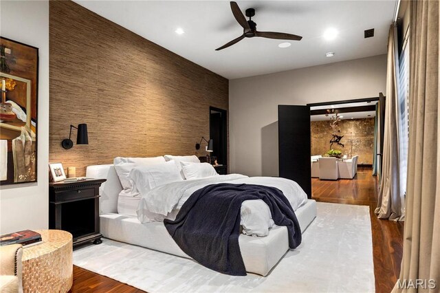 429 N Euclid Ave, Saint Louis, MO 63108 - bedroom featuring an accent wall, wood finished floors, recessed lighting, and ceiling fan