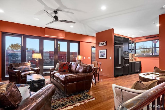 429 N Euclid Ave, Saint Louis, MO 63108 - living room with recessed lighting, wood finished floors, a ceiling fan, and baseboards