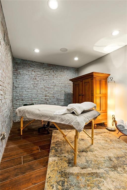 429 N Euclid Ave, Saint Louis, MO 63108 - bedroom featuring dark wood-type flooring and recessed lighting