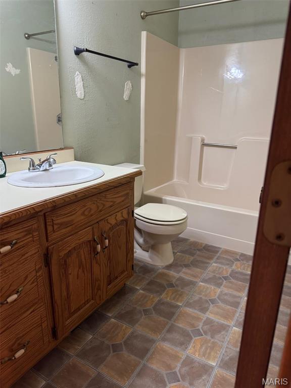 19924 Goldenwood Rd, Lebanon, MO 65536 - bathroom with  shower combination, vanity, and toilet
