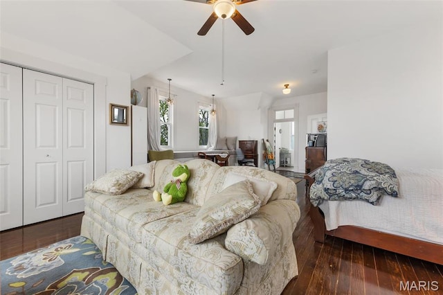 bedroom featuring hardwood / wood-style flooring, a closet, and ceiling fan