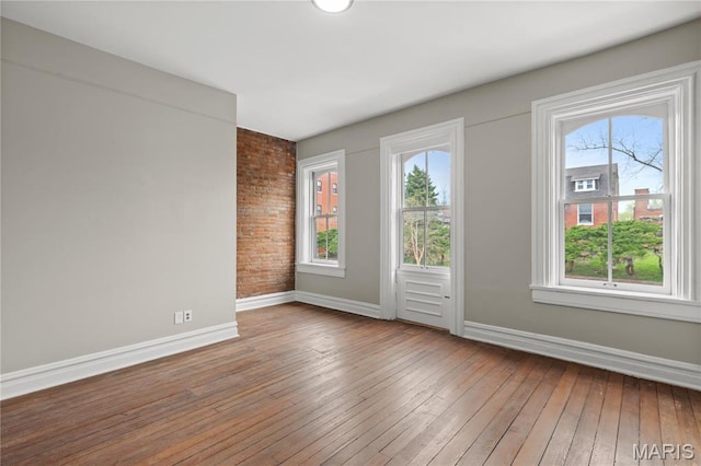 914 Russell Blvd, Saint Louis, MO 63104 - empty room featuring baseboards and hardwood / wood-style flooring