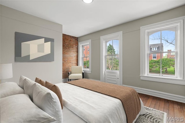 914 Russell Blvd, Saint Louis, MO 63104 - bedroom with multiple windows and hardwood / wood-style floors