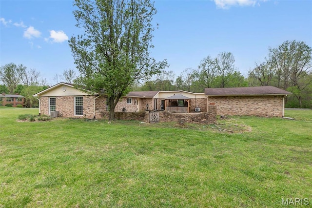 185 Garnet Ln, Cape Girardeau, MO 63701 - view of front of home with a front lawn and brick siding
