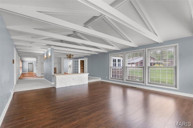 185 Garnet Ln, Cape Girardeau, MO 63701 - unfurnished living room with baseboards, wood finished floors, and a chandelier