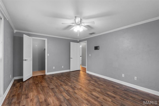 185 Garnet Ln, Cape Girardeau, MO 63701 - unfurnished bedroom featuring dark wood-style flooring, baseboards, ornamental molding, and a ceiling fan