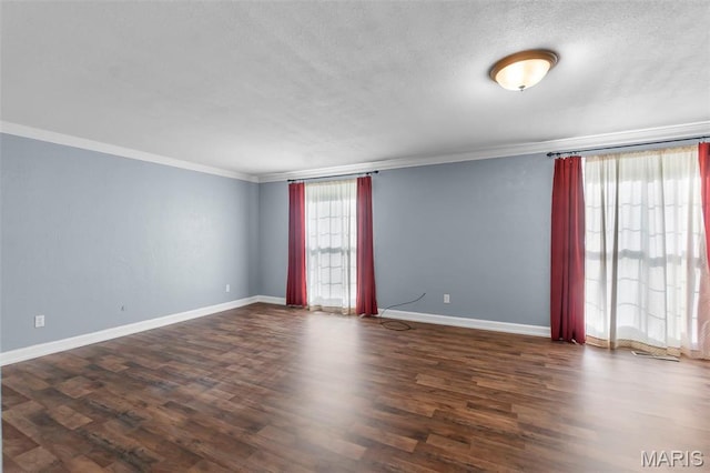 185 Garnet Ln, Cape Girardeau, MO 63701 - spare room featuring ornamental molding, dark wood finished floors, baseboards, and a textured ceiling