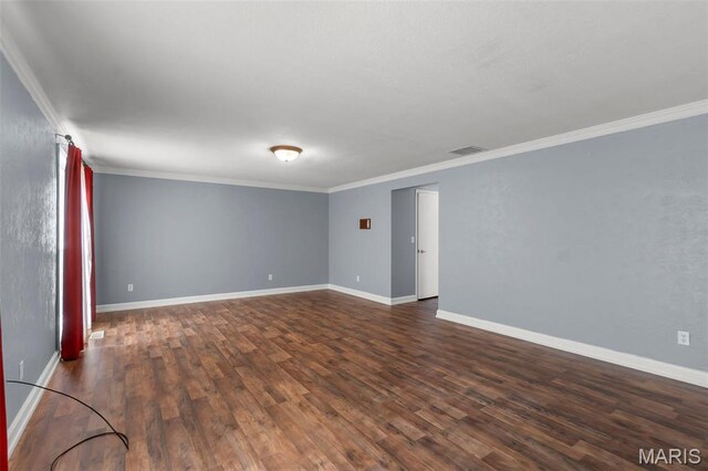 185 Garnet Ln, Cape Girardeau, MO 63701 - unfurnished room featuring crown molding, dark wood-style floors, and baseboards