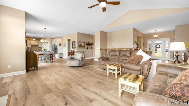 304 Wood Duck Ct, Waterloo, IL 62298 - living area with ceiling fan, light wood finished floors, baseboards, a chandelier, and lofted ceiling