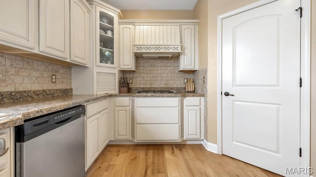 304 Wood Duck Ct, Waterloo, IL 62298 - kitchen with appliances with stainless steel finishes, light wood-type flooring, glass insert cabinets, and decorative backsplash