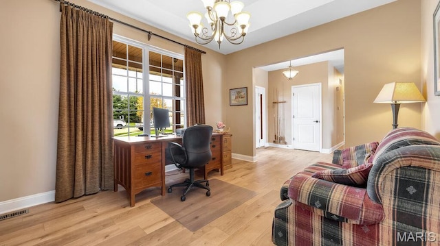304 Wood Duck Ct, Waterloo, IL 62298 - office space featuring a chandelier, baseboards, and light wood-style floors
