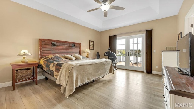 304 Wood Duck Ct, Waterloo, IL 62298 - bedroom with access to outside, a raised ceiling, baseboards, and light wood finished floors