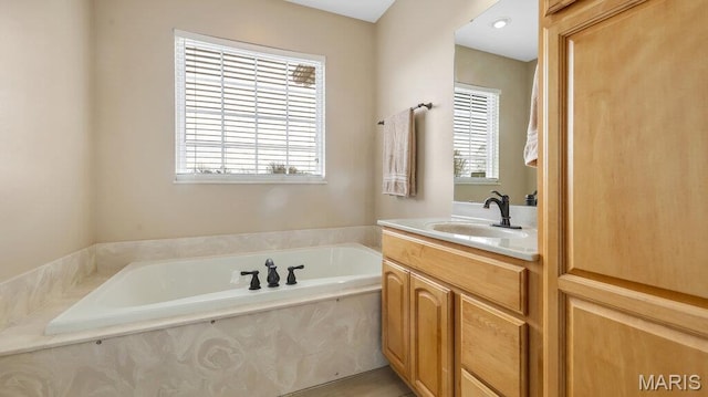 304 Wood Duck Ct, Waterloo, IL 62298 - bathroom with healthy amount of natural light, vanity, and a garden tub