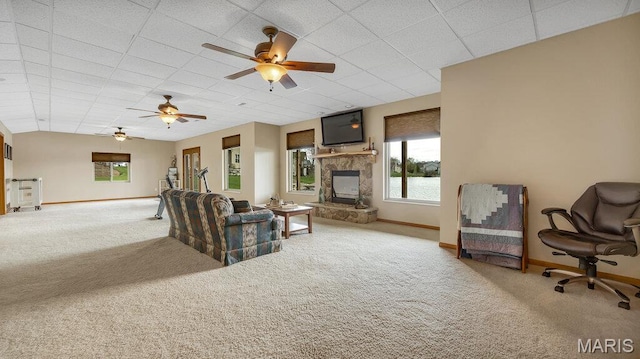 304 Wood Duck Ct, Waterloo, IL 62298 - carpeted living room featuring baseboards, a drop ceiling, ceiling fan, and a fireplace