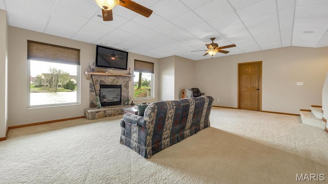 304 Wood Duck Ct, Waterloo, IL 62298 - carpeted living area featuring ceiling fan, baseboards, a fireplace, and a paneled ceiling