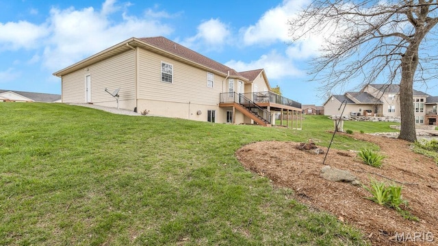 304 Wood Duck Ct, Waterloo, IL 62298 - rear view of house with a deck, a lawn, and stairs