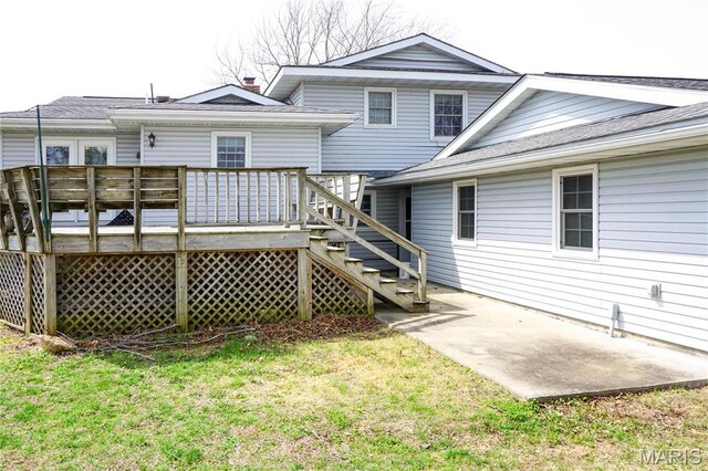 1502 Independence Rd, Rolla, MO 65401 - back of property with a patio, a lawn, a deck, and stairs