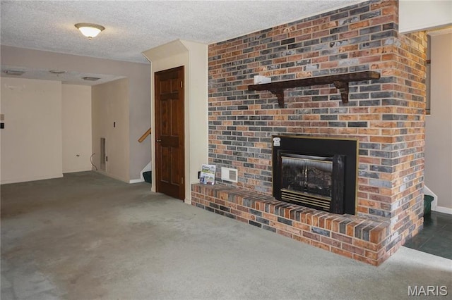 1502 Independence Rd, Rolla, MO 65401 - unfurnished living room with carpet floors, a brick fireplace, stairs, a textured ceiling, and baseboards