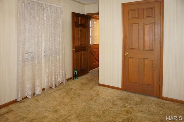 1502 Independence Rd, Rolla, MO 65401 - carpeted empty room featuring baseboards and wallpapered walls