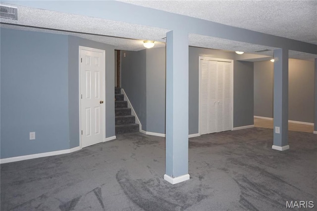 1502 Independence Rd, Rolla, MO 65401 - finished basement with carpet, a textured ceiling, baseboards, and stairs