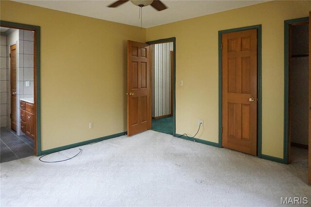 1502 Independence Rd, Rolla, MO 65401 - unfurnished bedroom with carpet flooring, baseboards, and ceiling fan