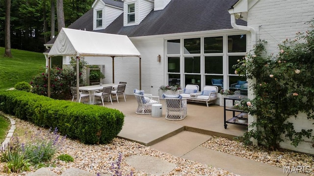 323 White Oaks Ln, Cape Girardeau, MO 63701 - view of patio featuring an outdoor living space and a gazebo