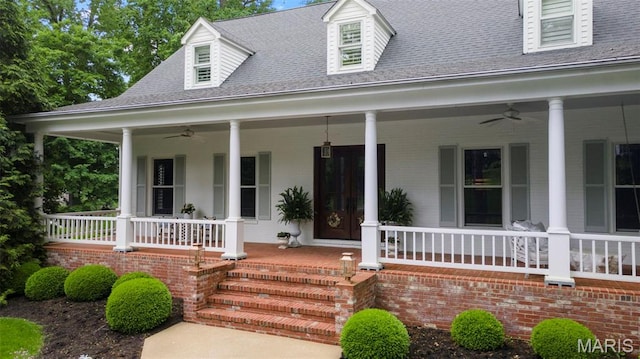 323 White Oaks Ln, Cape Girardeau, MO 63701 - doorway to property with covered porch, a ceiling fan, and a shingled roof