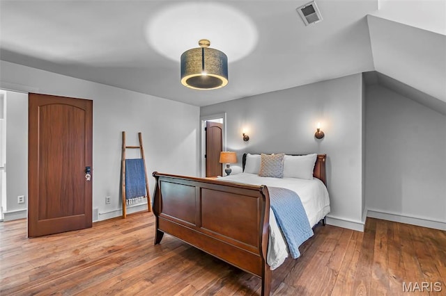 323 White Oaks Ln, Cape Girardeau, MO 63701 - bedroom with hardwood / wood-style floors and baseboards