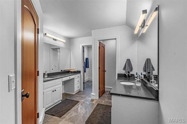323 White Oaks Ln, Cape Girardeau, MO 63701 - full bath featuring vanity, marble finish flooring, and baseboards