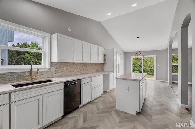 283 Sonnet Cir, Wentzville, MO 63385 - kitchen with dishwasher, a sink, vaulted ceiling, open shelves, and white cabinetry