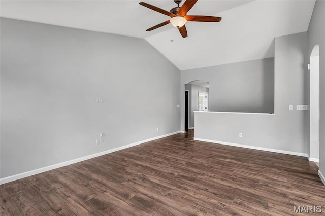 283 Sonnet Cir, Wentzville, MO 63385 - spare room with arched walkways, ceiling fan, lofted ceiling, dark wood finished floors, and baseboards
