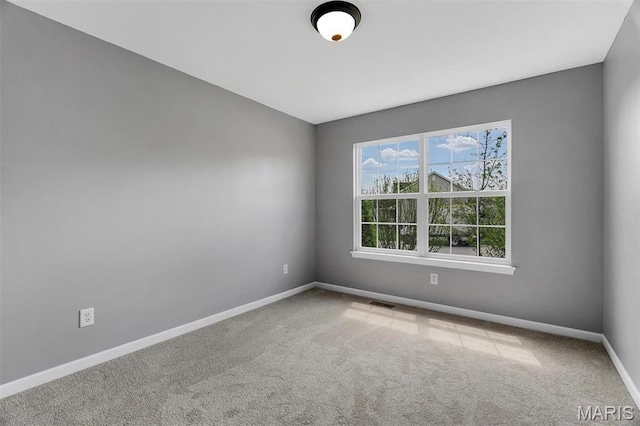 283 Sonnet Cir, Wentzville, MO 63385 - carpeted spare room featuring baseboards
