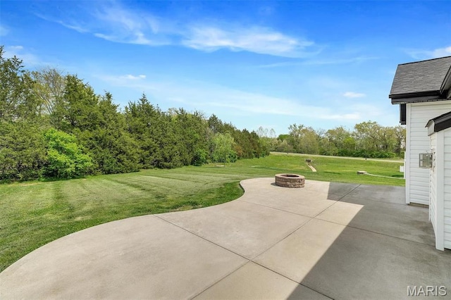 283 Sonnet Cir, Wentzville, MO 63385 - view of patio featuring a fire pit