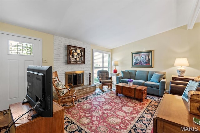 1500 Ridgewood Dr, Saint Louis, MO 63126 - living area with lofted ceiling, wood finished floors, and a brick fireplace