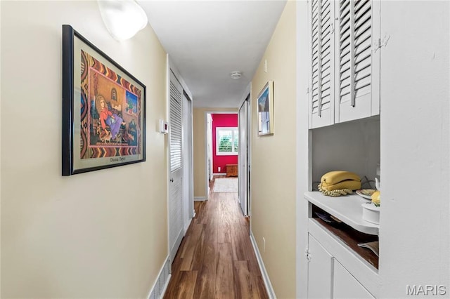 1500 Ridgewood Dr, Saint Louis, MO 63126 - corridor featuring dark wood-type flooring and baseboards