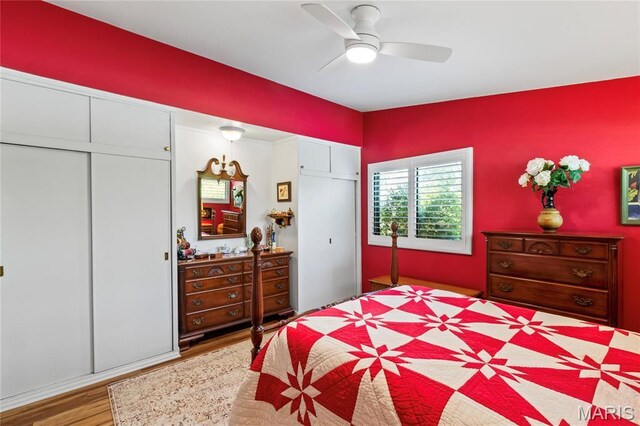 1500 Ridgewood Dr, Saint Louis, MO 63126 - bedroom with wood finished floors, a ceiling fan, and a closet