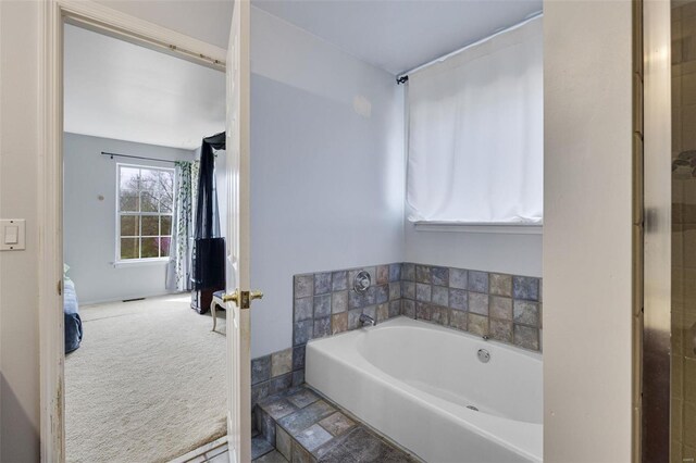 full bathroom featuring a garden tub