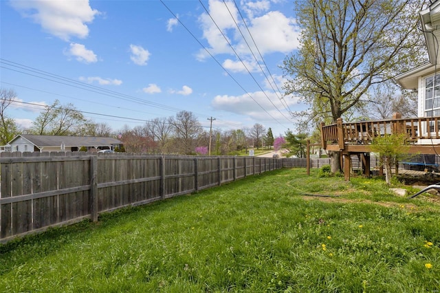 view of yard featuring a deck