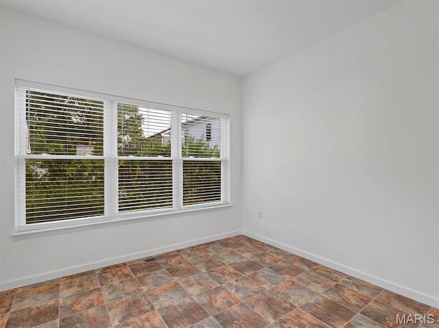 602 S Ballas Rd, Saint Louis, MO 63122 - unfurnished room featuring stone finish flooring
