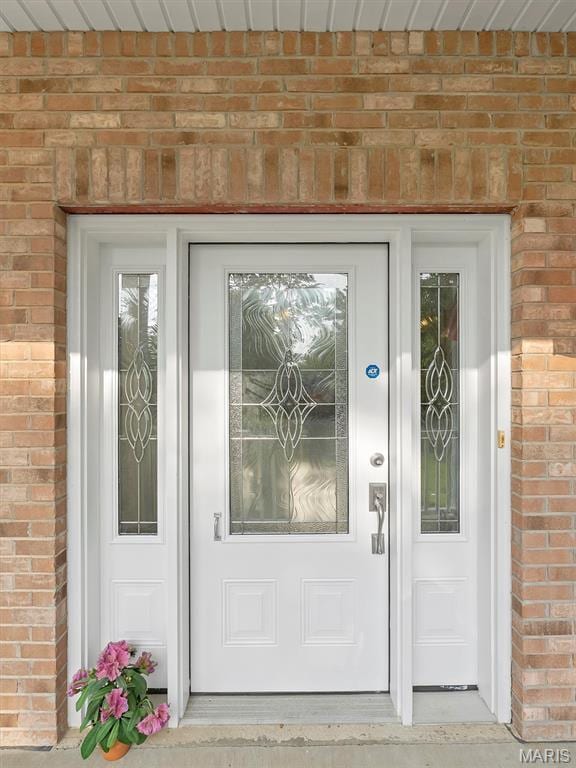 602 S Ballas Rd, Saint Louis, MO 63122 - doorway to property featuring brick siding