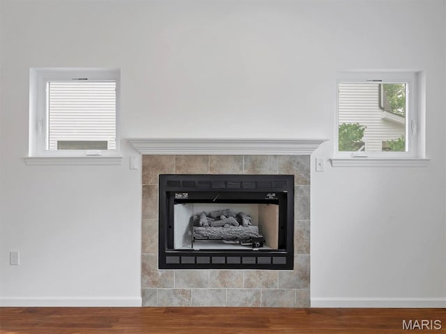 602 S Ballas Rd, Saint Louis, MO 63122 - detailed view of a tiled fireplace and wood finished floors