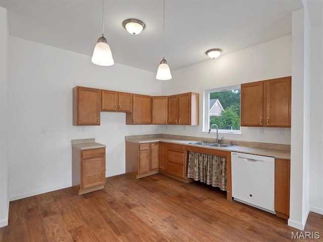 602 S Ballas Rd, Saint Louis, MO 63122 - kitchen featuring white dishwasher, dark wood-style floors, pendant lighting, brown cabinets, and light countertops