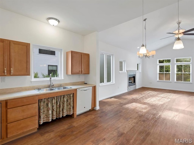 602 S Ballas Rd, Saint Louis, MO 63122 - kitchen with dishwasher, a fireplace, lofted ceiling, dark wood-type flooring, and light countertops